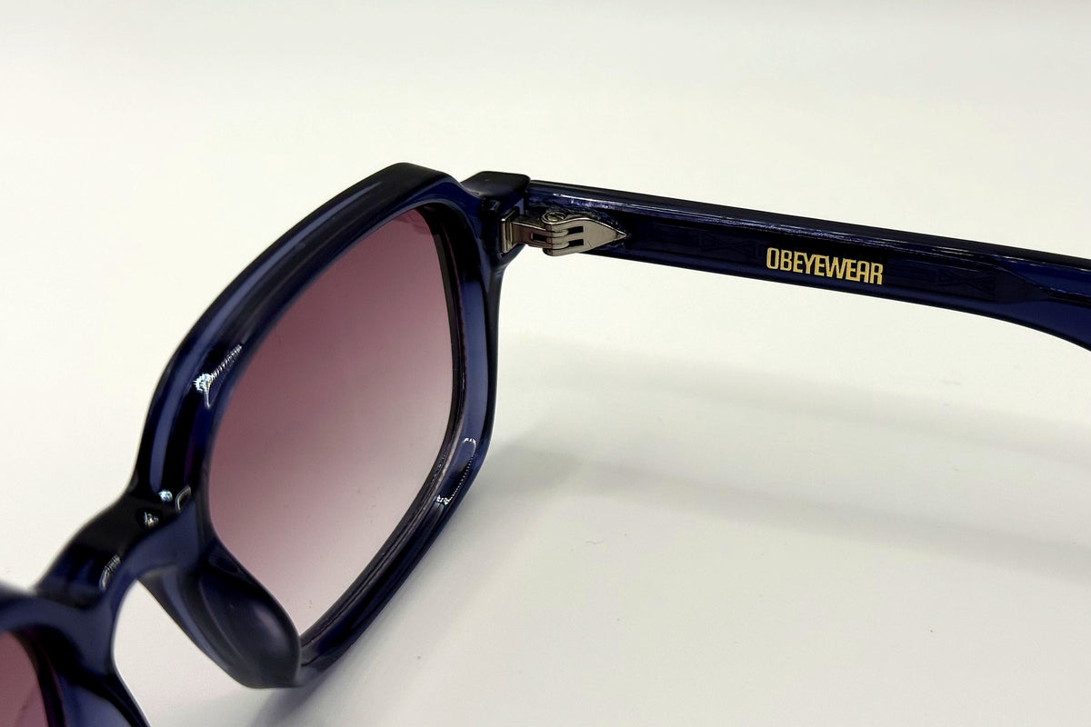 OBE 001 Blue Haze sunglasses, temple arm logo