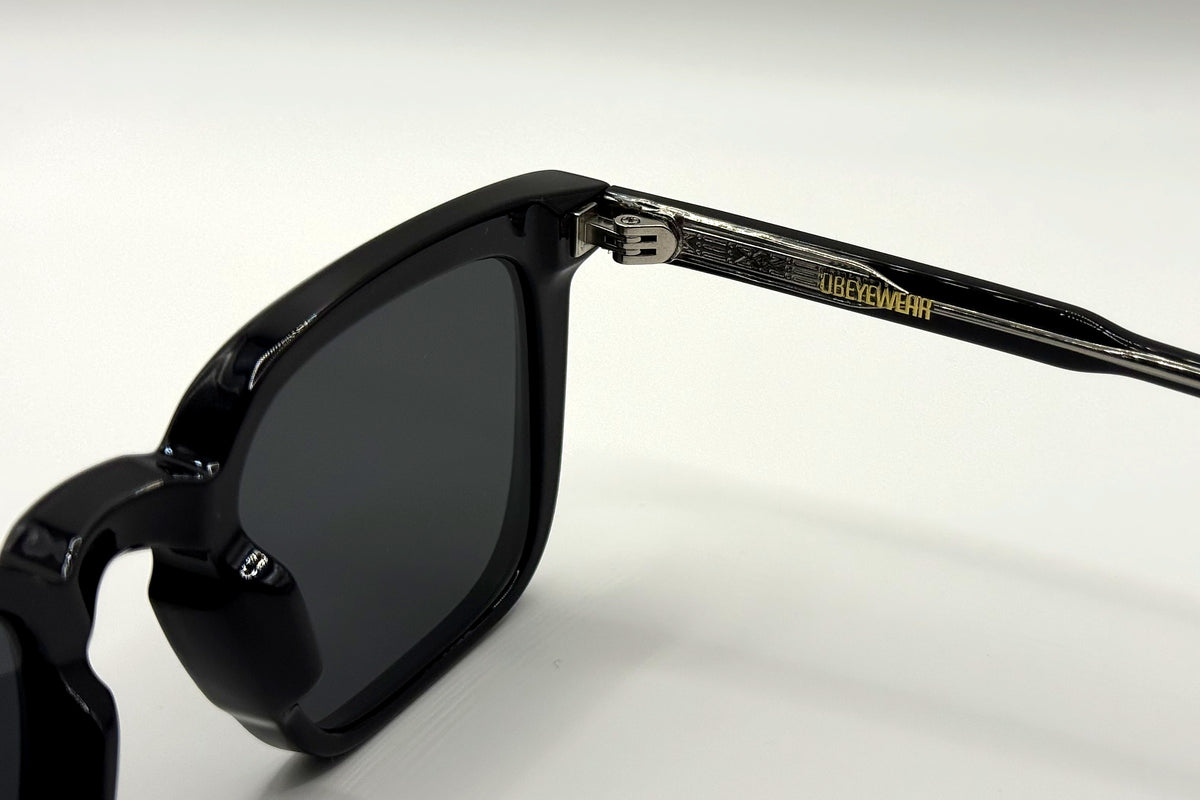 OBE 002 Black sunglasses, temple arm logo