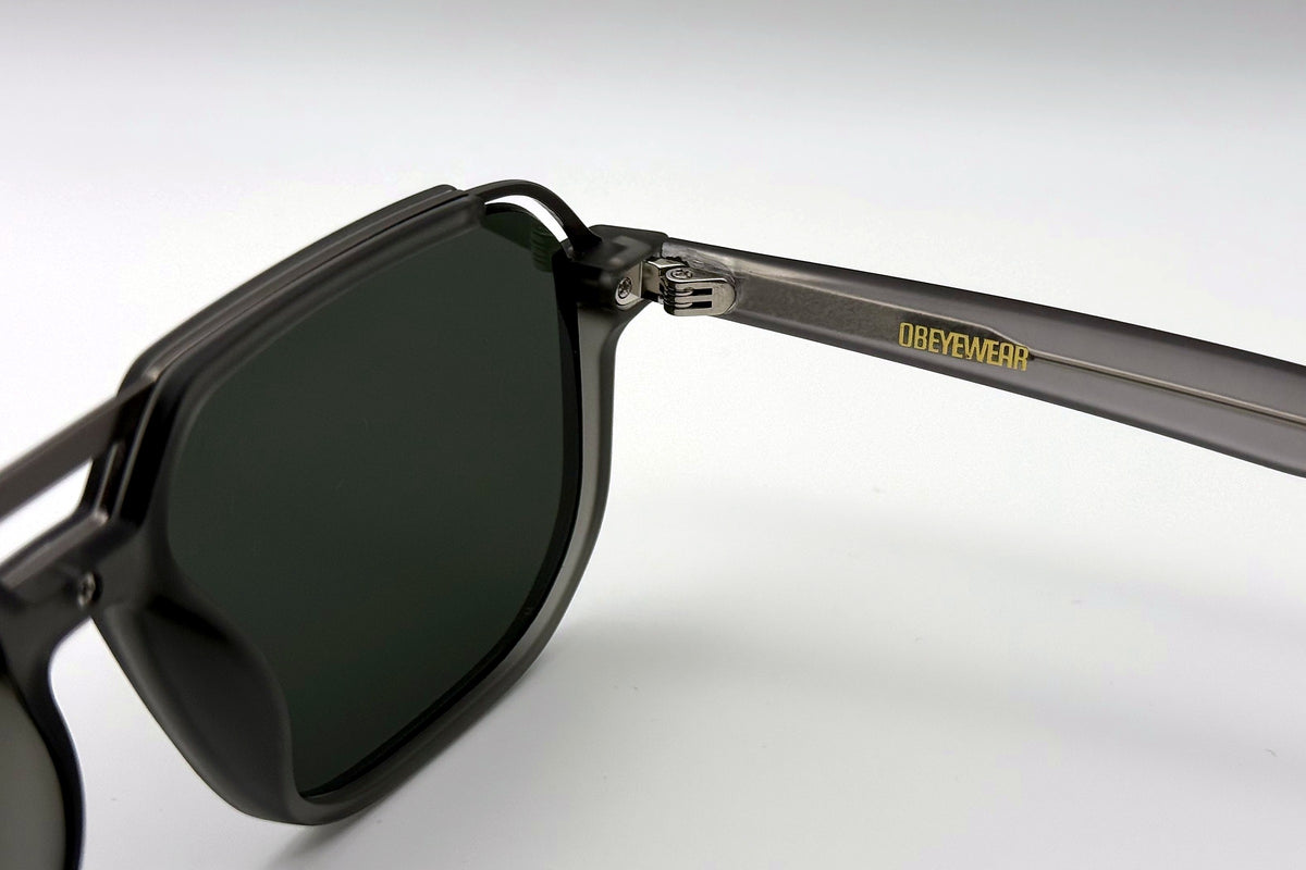 OBE 003 Grey with Green Lens sunglasses, temple arm logo
